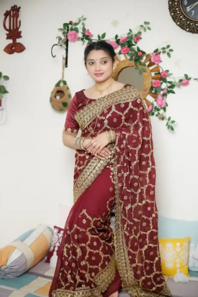 Elegant Maroon Weightless Georgette Saree with Intricate Golden Embroidery - Shopemart 1